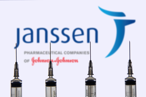 Janssen,Pharmaceutical,Companies,Logo,Against,Syringe,Or,Injection,Needle.,Johnson
