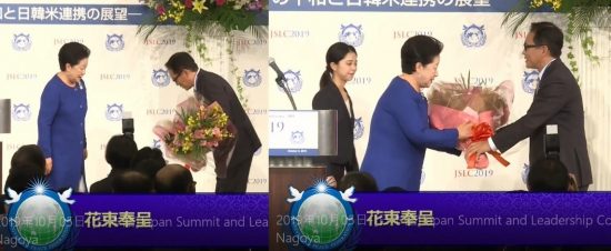 講演を終えた韓総裁に花束を贈呈する江島潔参議院議員